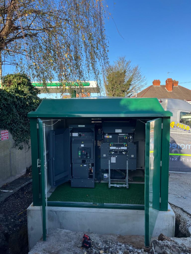 Substation kiosk open showing internal switchgear and distribution boards — Coseley Dudley